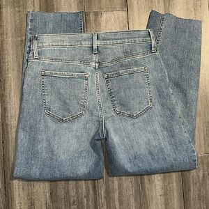 Size 2 / 26 Banana Republic Girlfriend Distressed blue jeans. Bottoms cut off